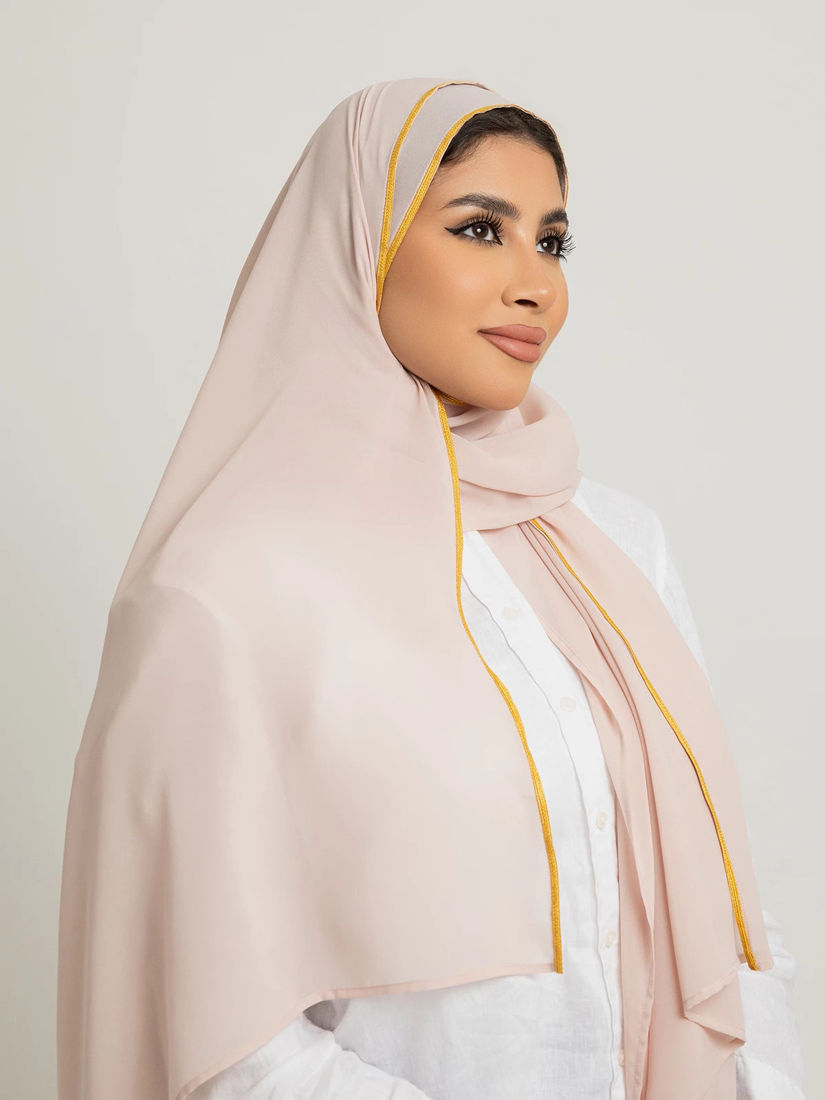 Pink soft and breathable chiffon laser hijab tarha with gold meshlah kulfa on the edge by kaafmeem for daily wear