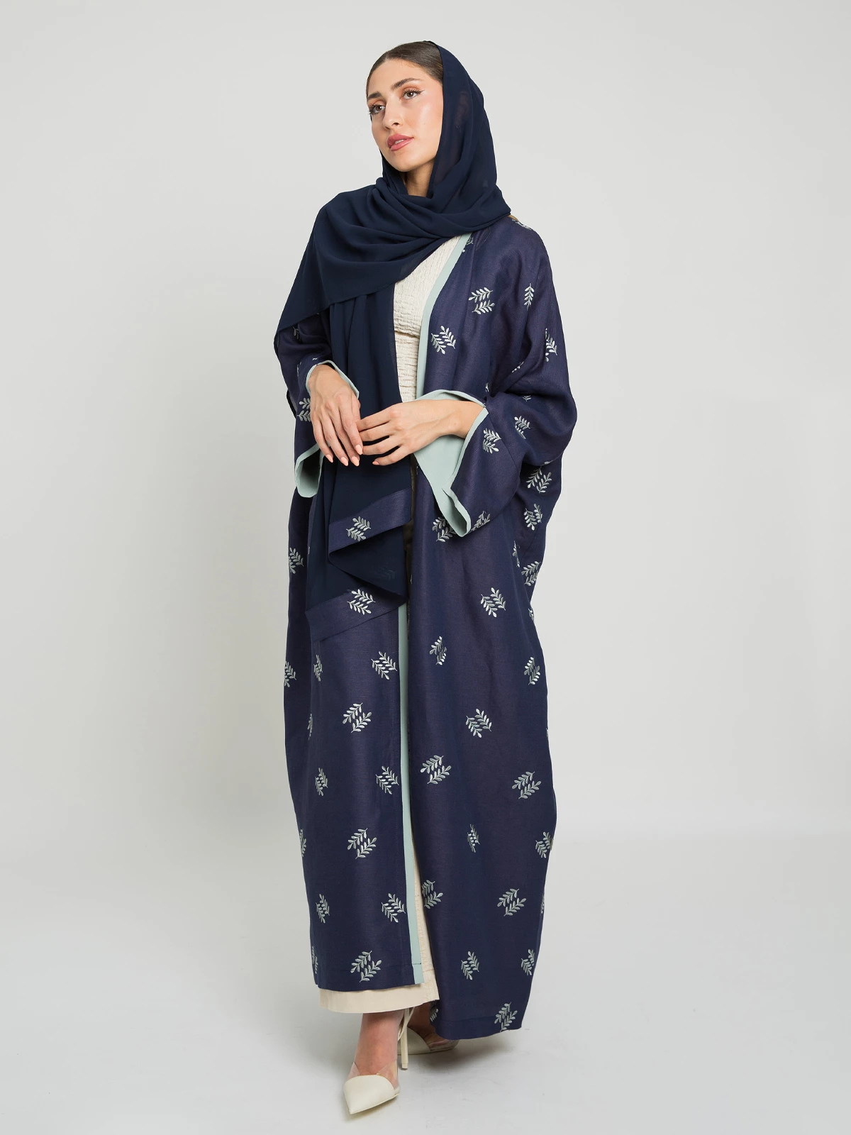 Navy open long fancy linen abaya with mint spikes embroidery in high quality fabric by kaafmeem for events and occasions