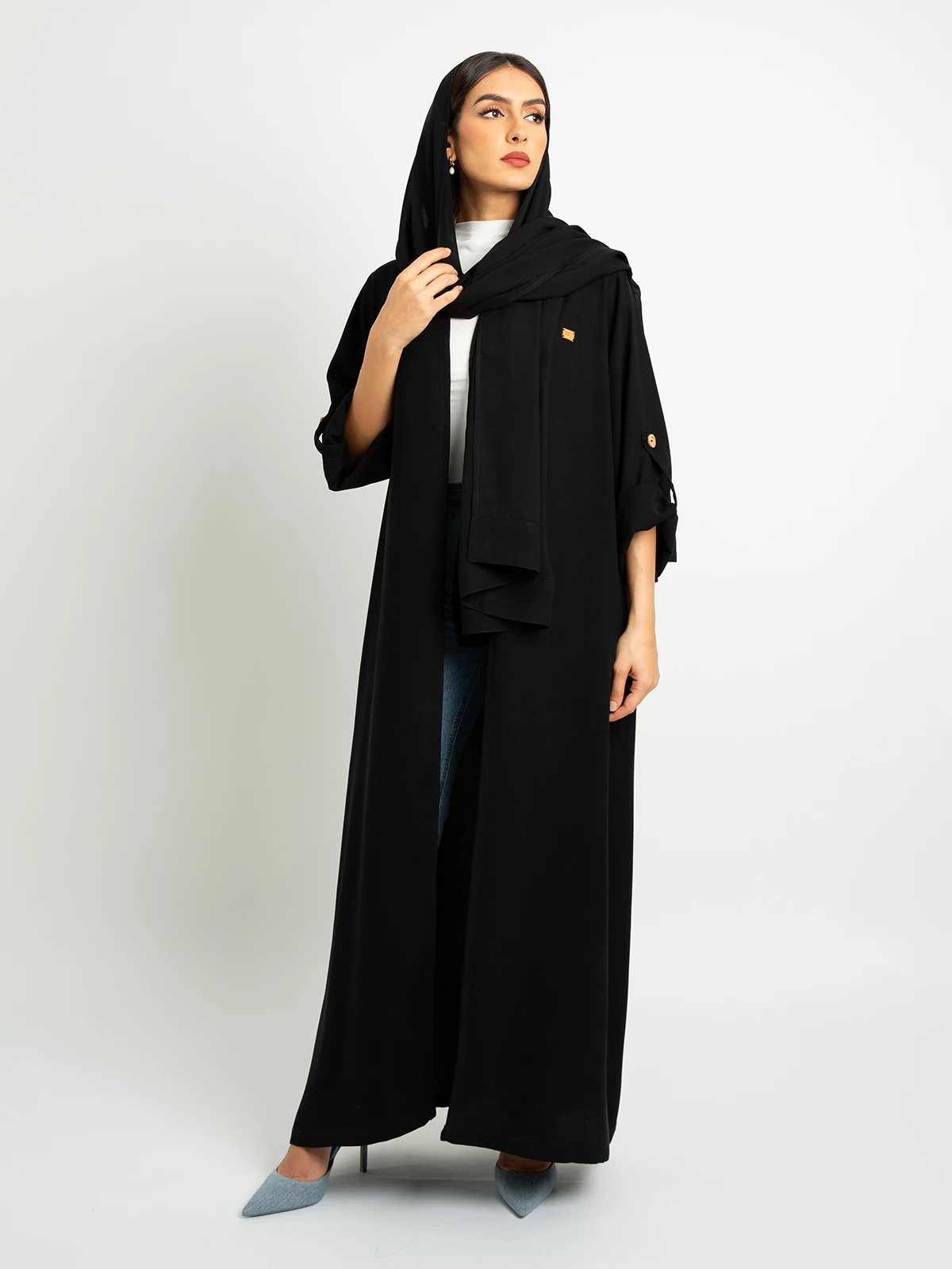 Black open regular fit long abaya in crepe fabric with adjustable sleeves and pockets by kaafmeem