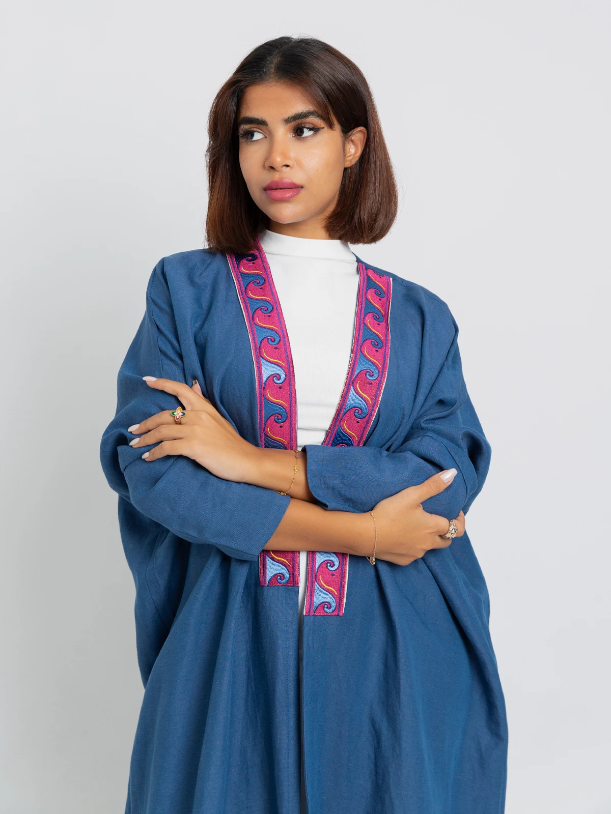 Blue long open half bisht abaya in high quality linen fabric by kaafmeem with magenta woven kulfa on the front