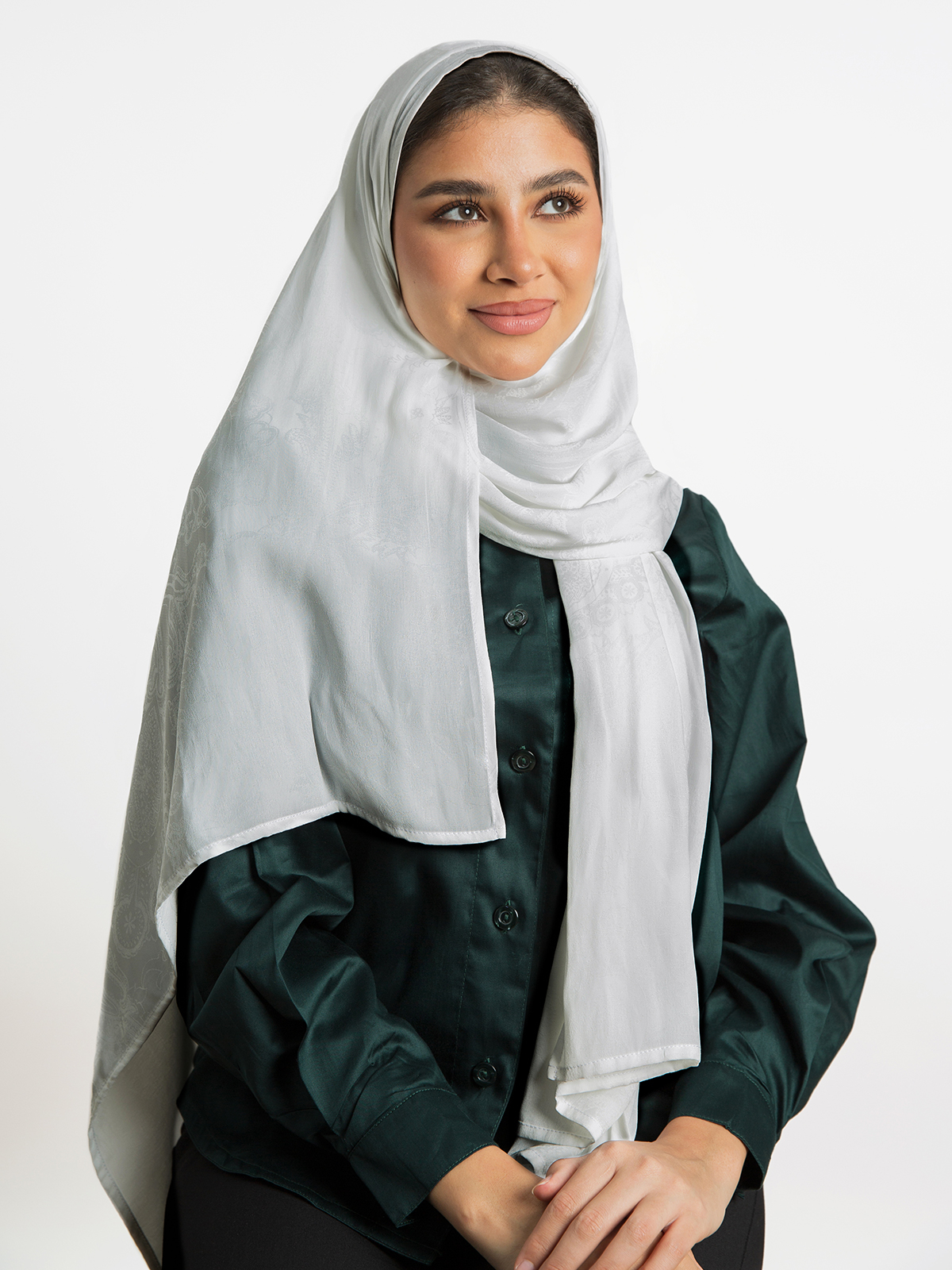 White soft and breathable ornamented hijab tarha by kaafmeem for daily wear available in multiple colors