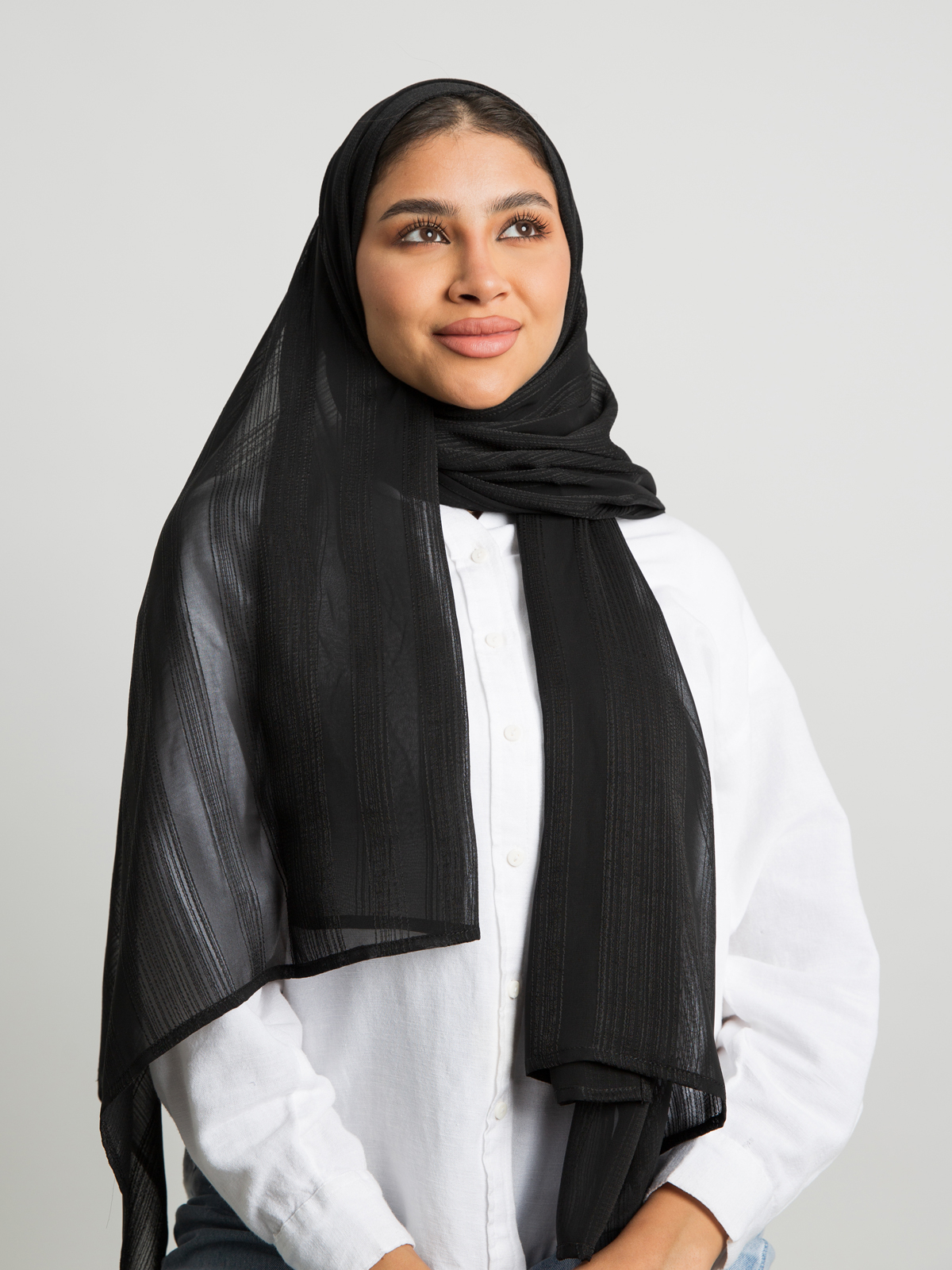 Black plain bundled stripes soft chiffon laser tarha by kaafmeem hijab for daily wear available in multiple colors