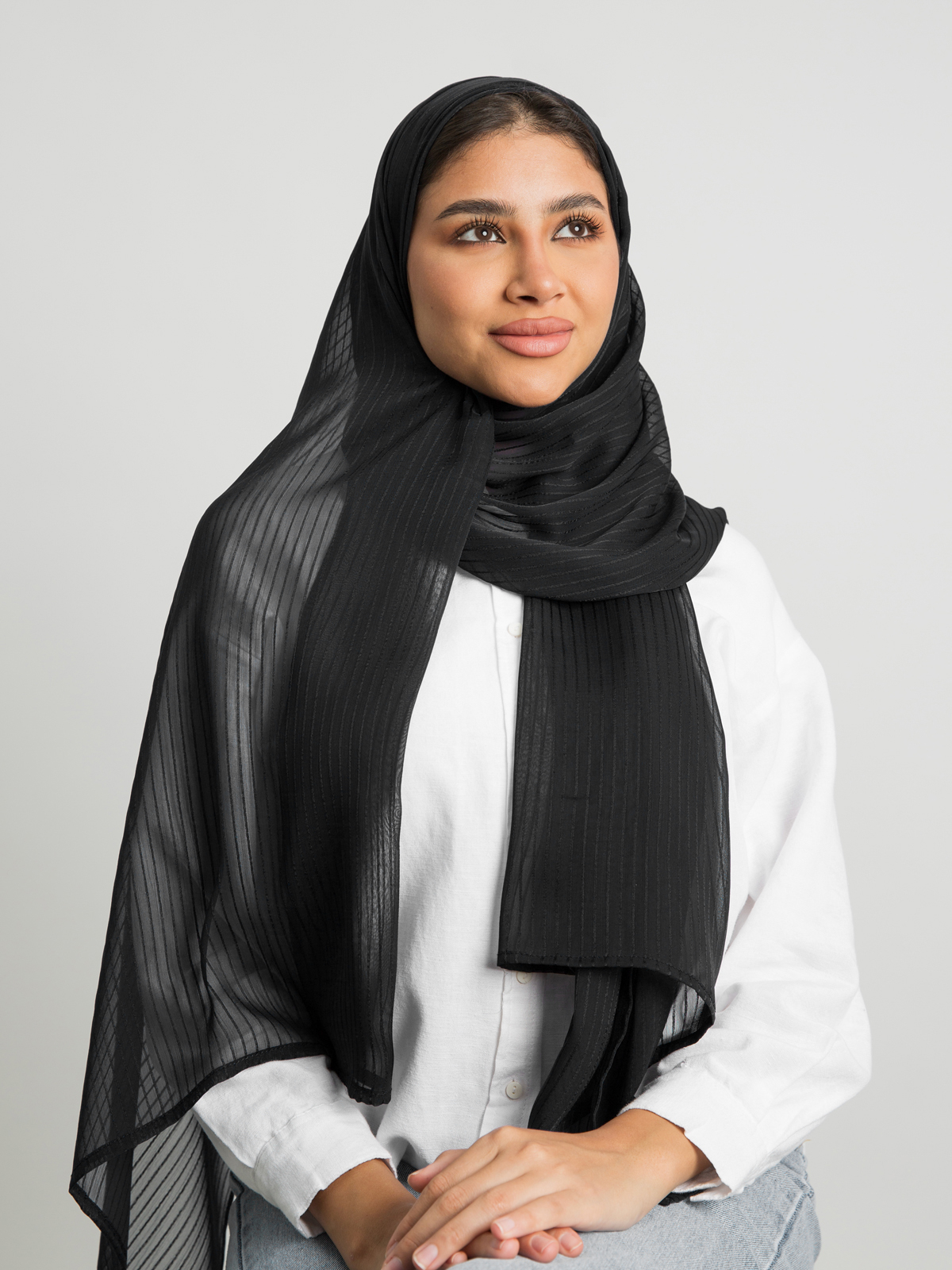 Black plain striped soft chiffon laser tarha by kaafmeem hijab for daily wear available in multiple colors