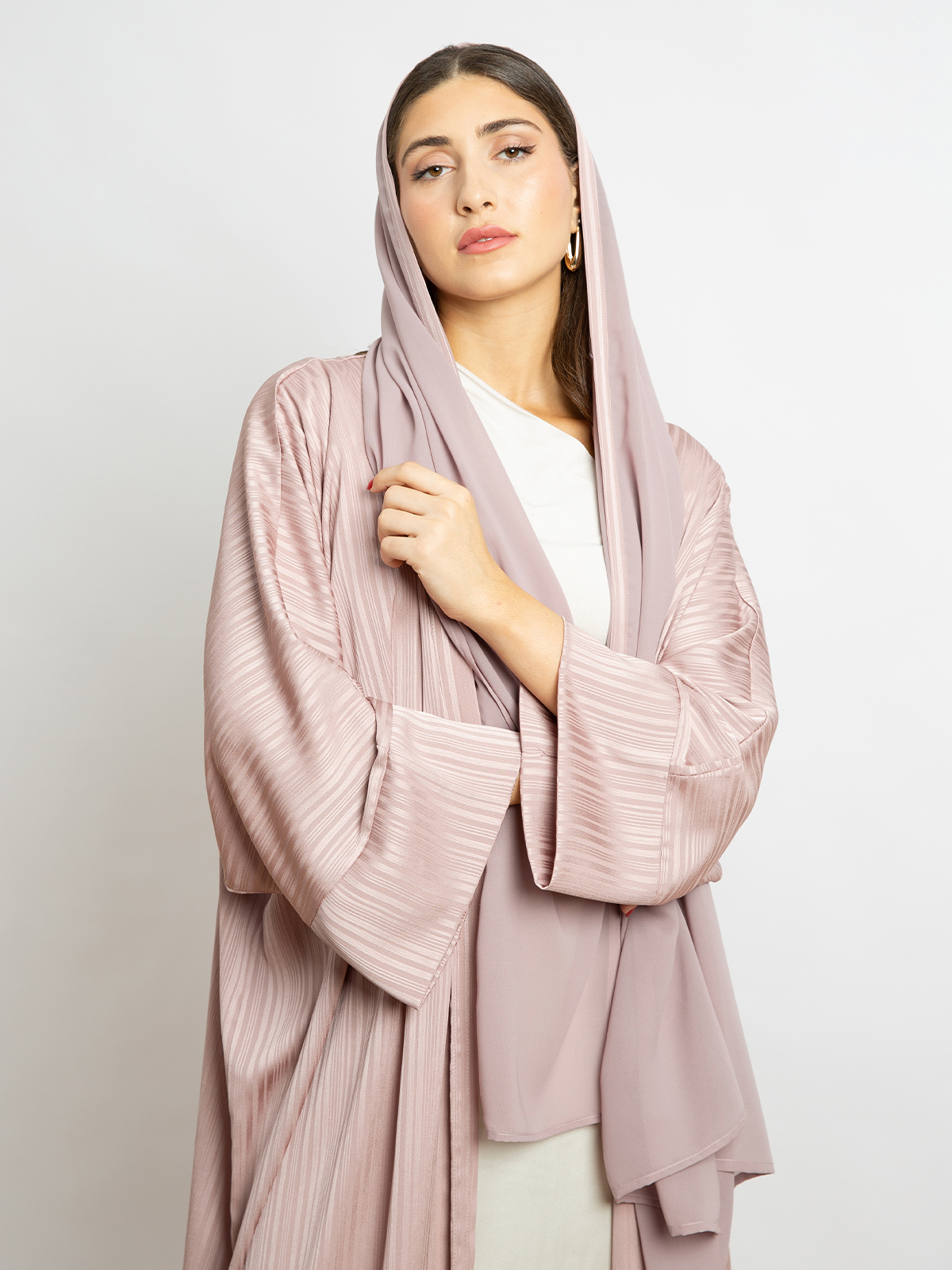 Long open wide cut abaya in pink stripes color with regular sleeves for special occasions and events