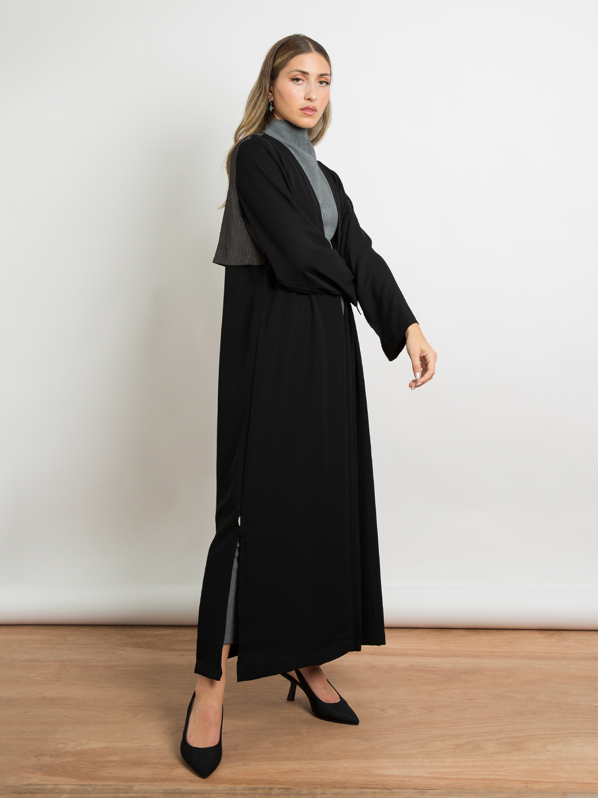 Black wide regular cut long open winter fancy abaya with black beehive yoke in soft winter fabric by kaafmeem