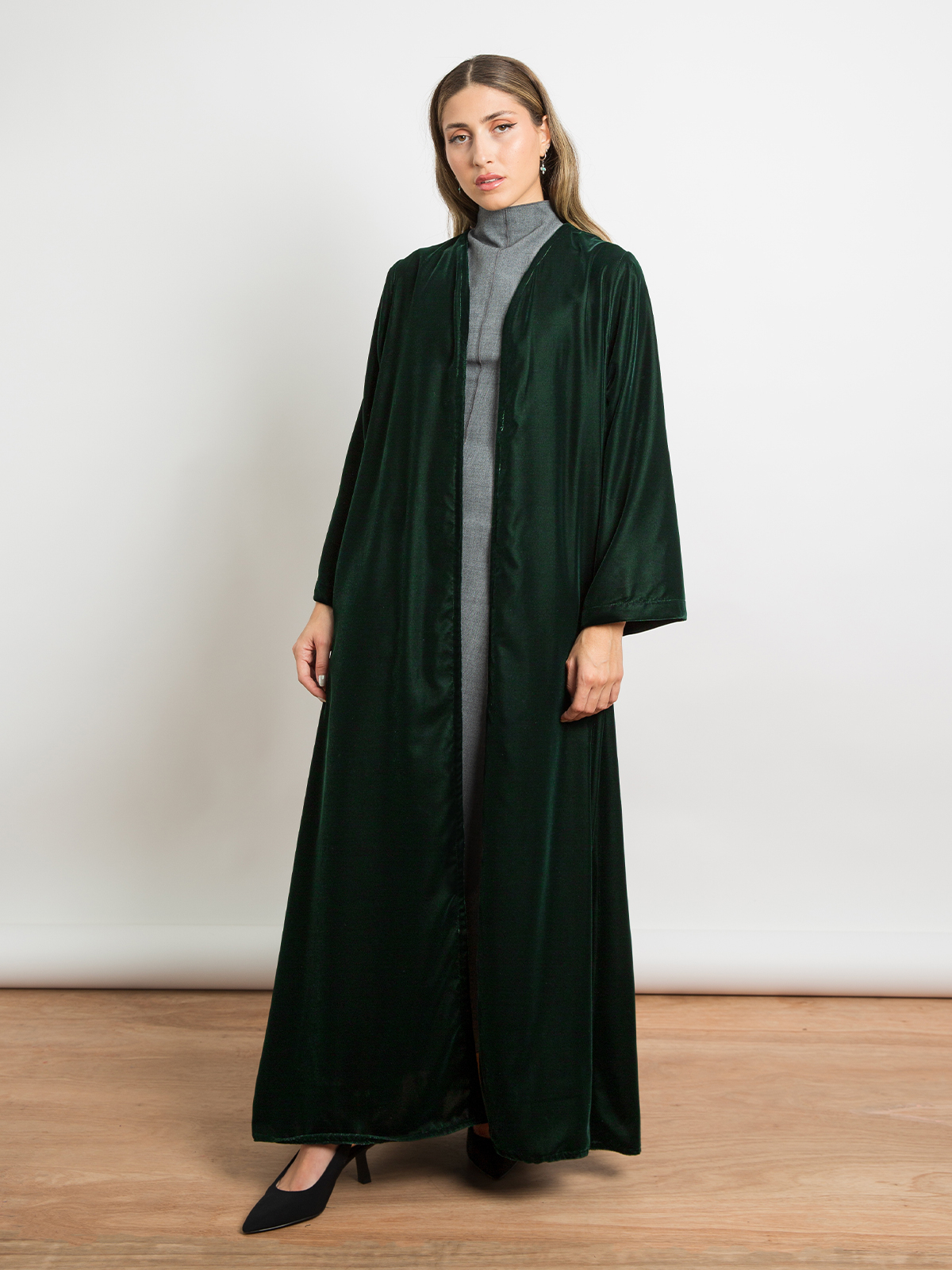 Green long open A cut half cloche winter abaya in soft velvet fabric by kaafmeem for work and different occasions 