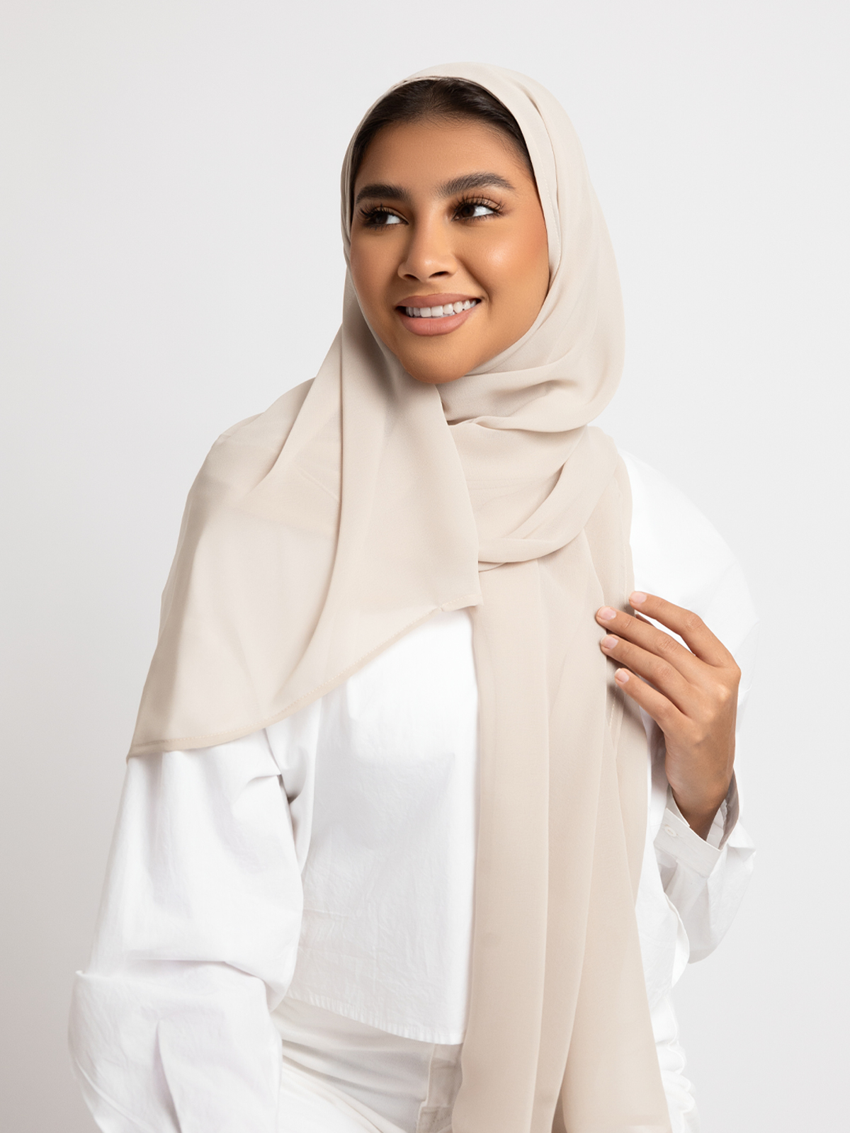 Luxurious chiffon hijab plain laser tarha 200 cm long beige color high quality material online in ksa by kaafmeem